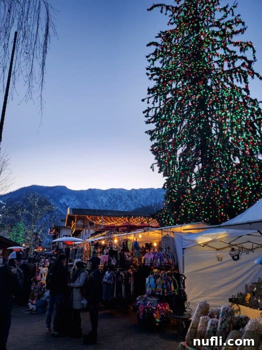 holiday lights in trees and on buildings above the Leavenworth Christmas market 