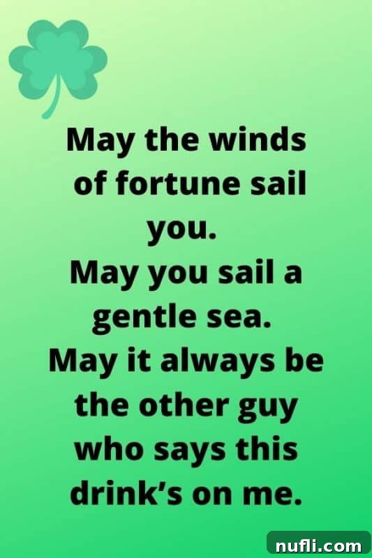 A green background with a shamrock, featuring the Irish toast: 'May the winds of fortune sail you' in elegant script.