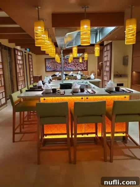 indoor seating with tall chairs next to a cooking surface