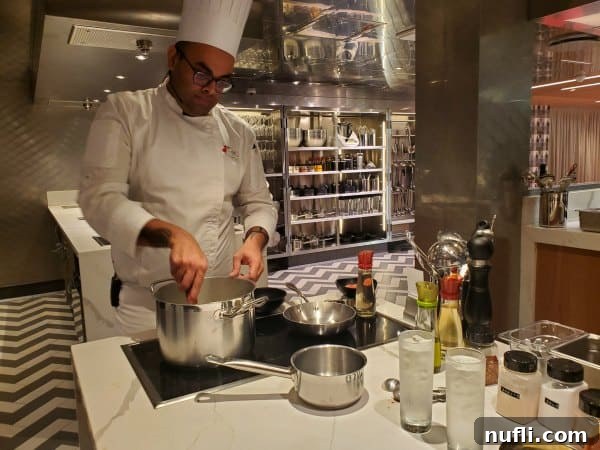 Carnival chef cooking on a stove top with a large pot
