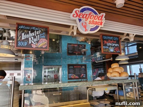 seafood shack sign over lobster roll and clam chowder sign, bread bowls