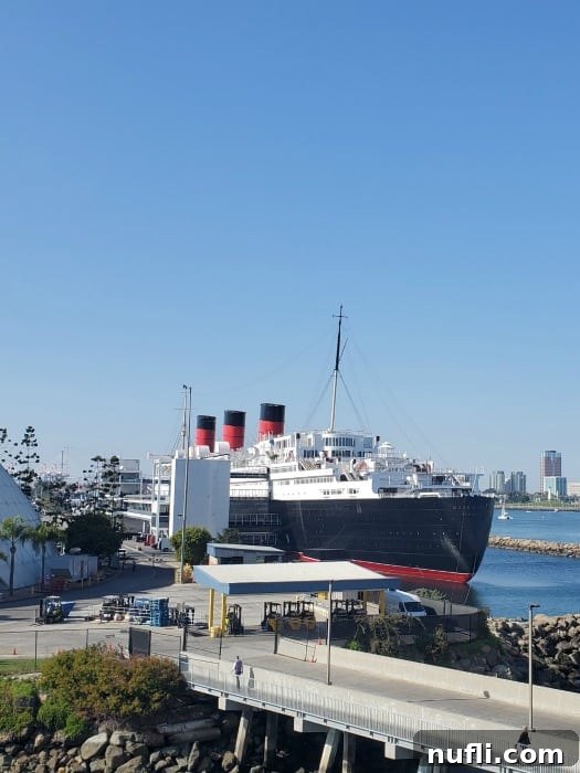 Queen Mary ship next to the port 