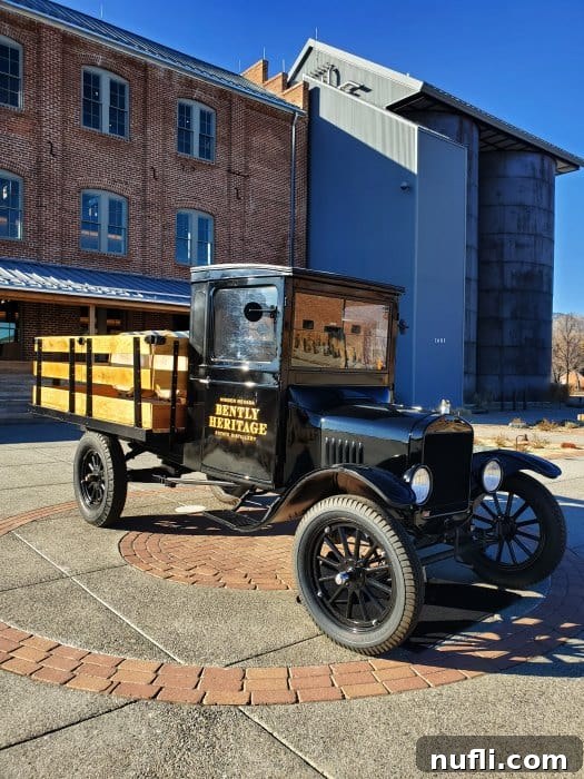 Signature Ranch Tea Cocktail 3 Historic Bently Heritage branded truck parked outside the distillery