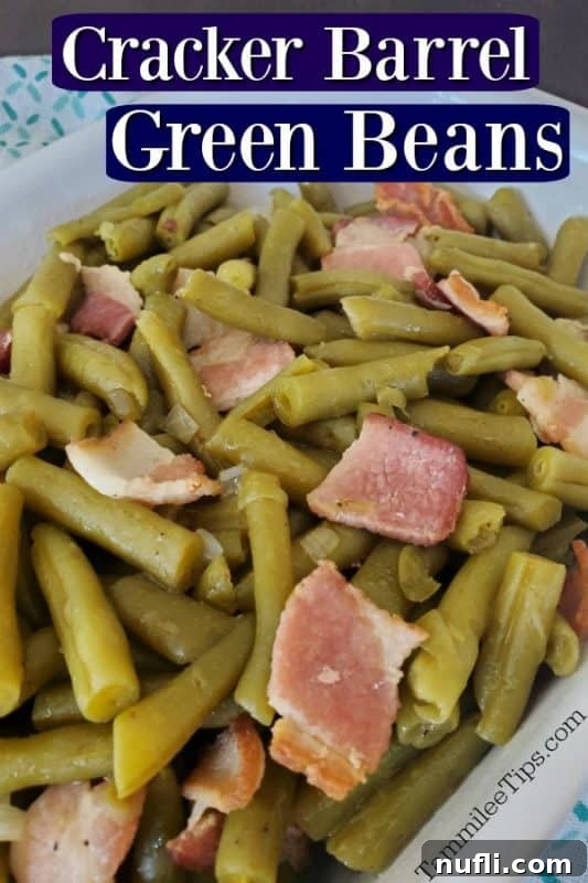 Cracker Barrel Green Beans text over the photo with green beans and bacon in a white serving dish