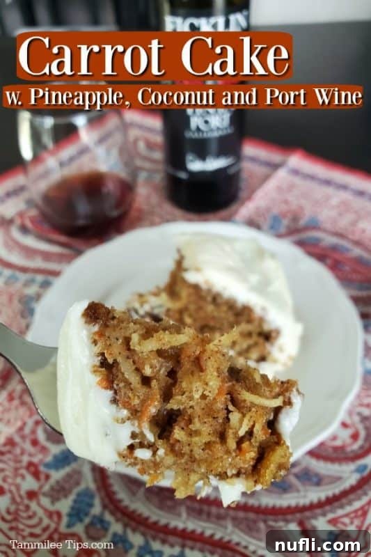 Port Wine Carrot Cake with Pineapple and Coconut 2 A delectable slice of carrot cake, adorned with creamy frosting, sits beside a fork ready to be enjoyed. The cake is rich with pineapple, coconut, and a hint of port wine.