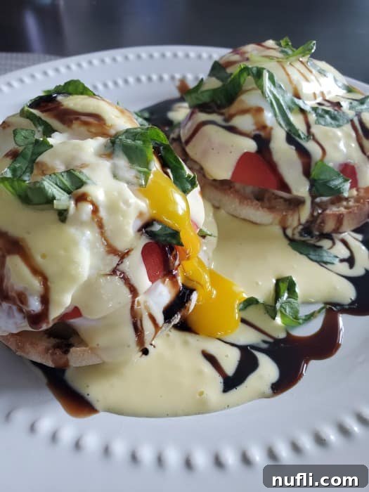 Caprese Eggs Benedict on a white plate