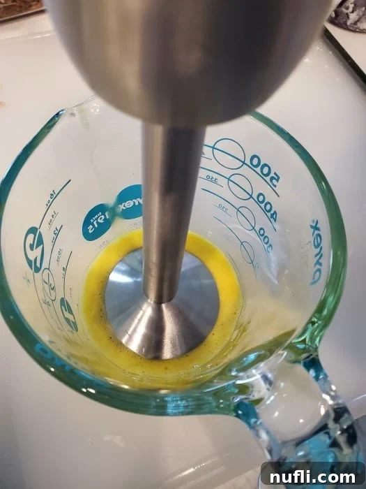 immersion blender in egg yolks