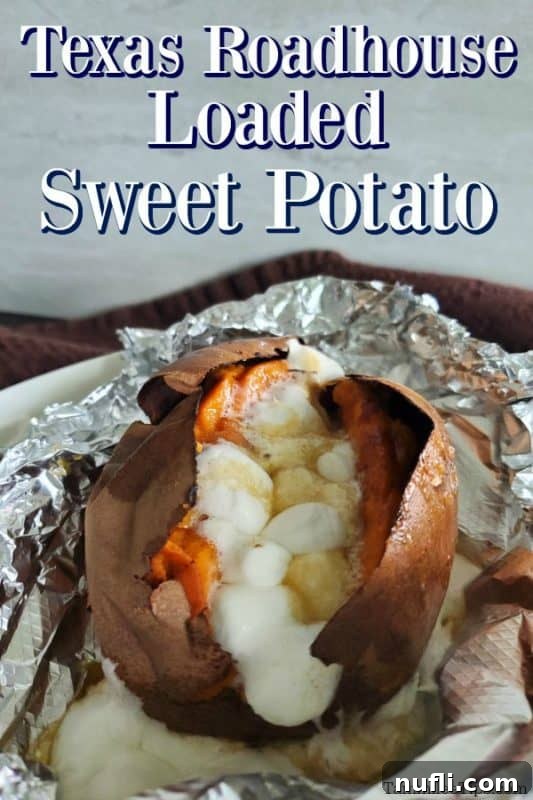 Texas Roadhouse Loaded Sweet Potato, generously topped with melted mini marshmallows and caramel sauce, served in its foil wrapper.