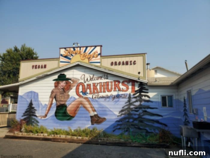 Welcome to Oakhurst mural with a female ranger on it