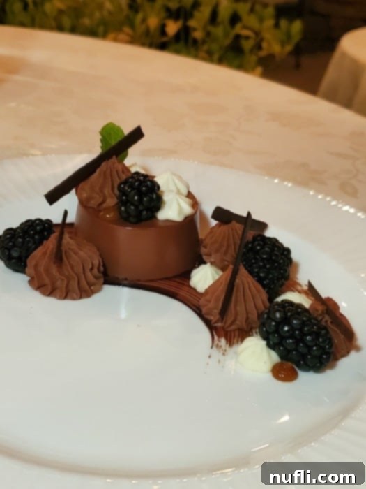 Decadent chocolate dessert on a white plate