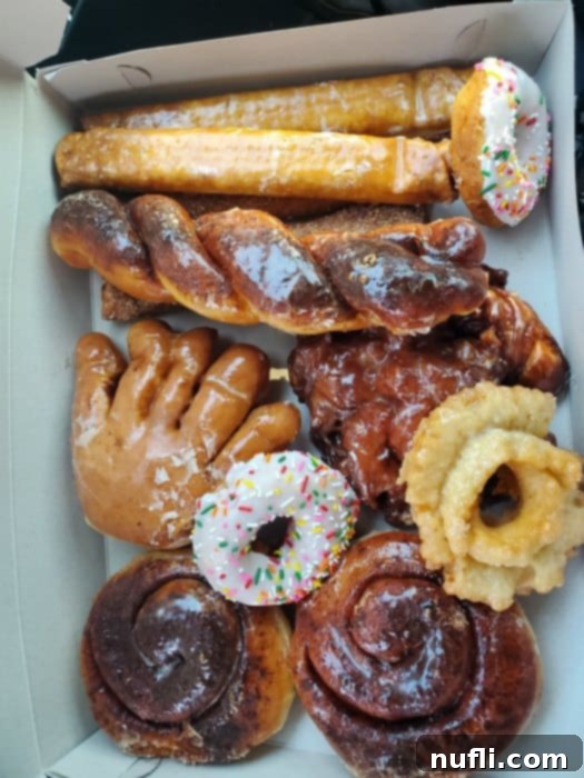 Box of Judy's donuts with different flavors