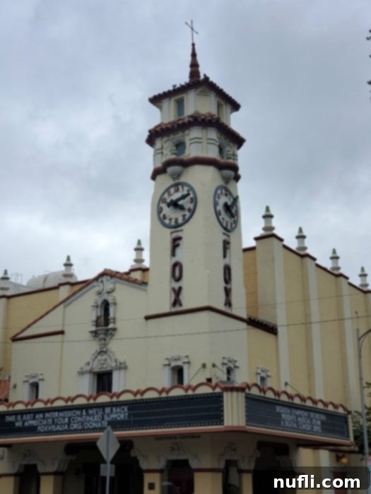 Fox theater with clock and historic tower in Visalia