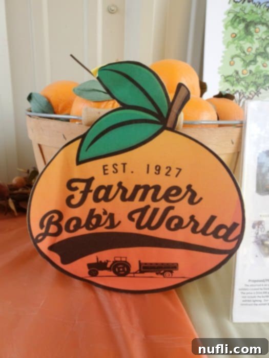 Farmer Bob's World sign with oranges in a basket