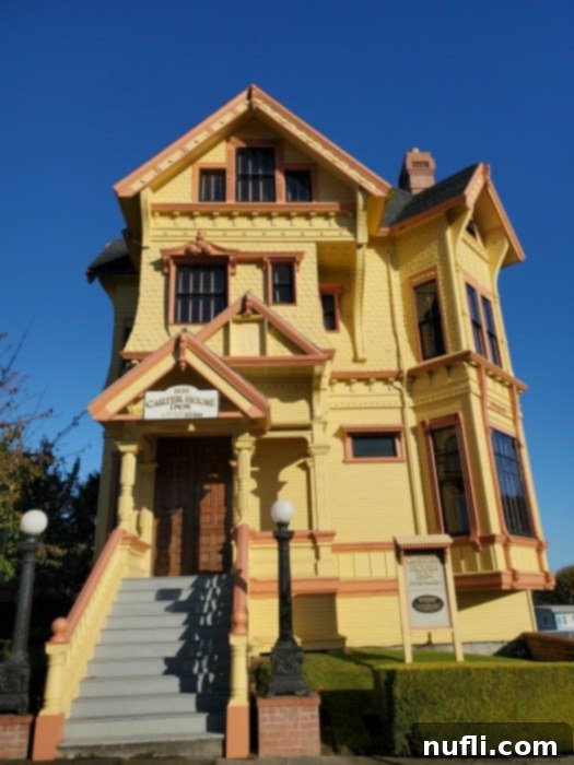 Historic yellow and orange house with multiple stories
