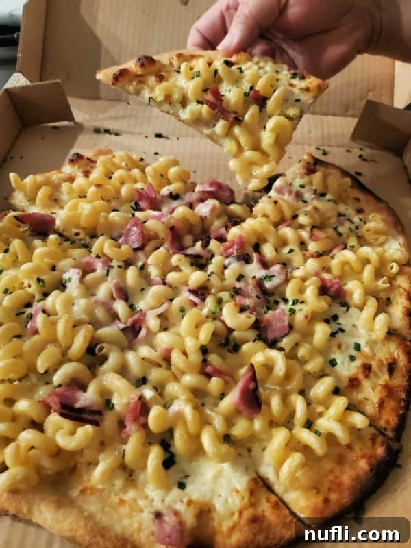 Spokane's Top Pizza Spots 11 mac and cheese and bacon on a pizza in a delivery box