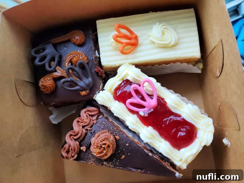 Spokane's Sweetest Spots A Bakery Guide 14 cake slices in a cardboard bakery box