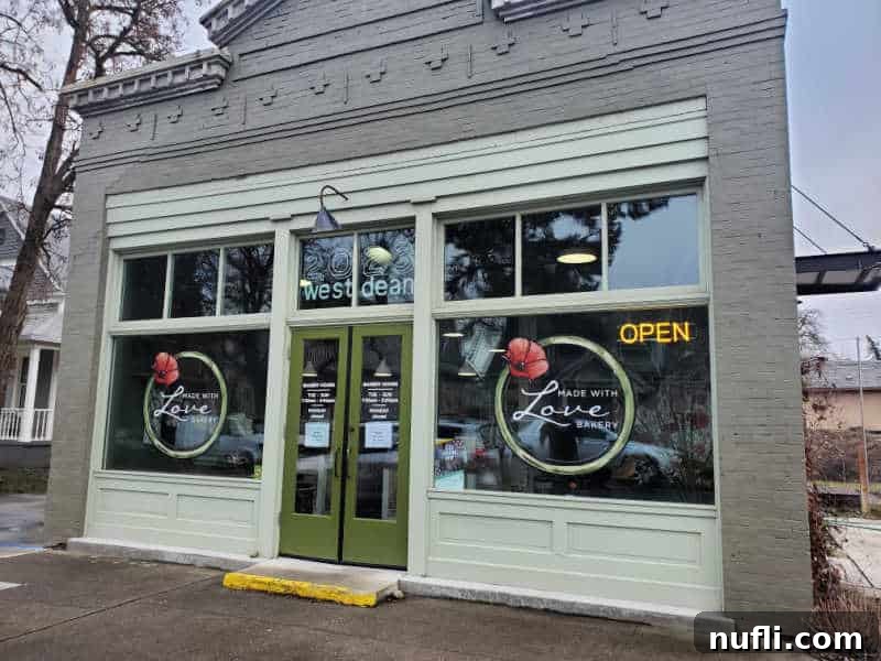 Spokane's Top Bakeries: Your Sweetest Guide 3 Made with love sign on the glass by the entrance doors to a bakery