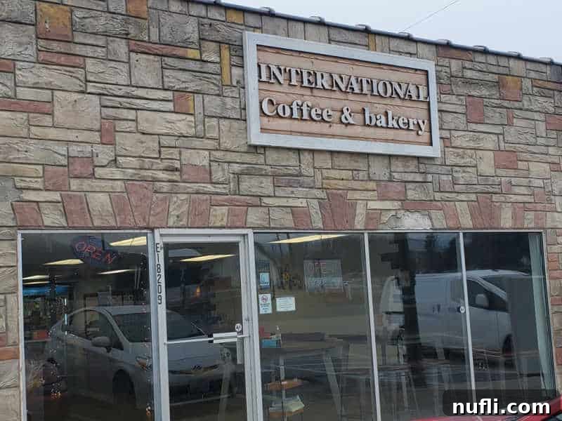 Spokane's Sweetest Spots A Bakery Guide 24 International Coffee & Bakery sign on a brick building