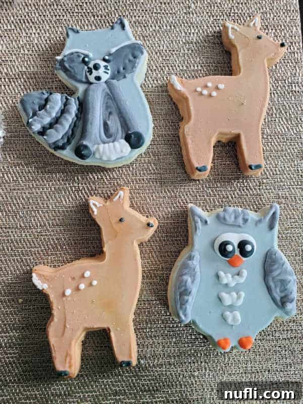 Spokane's Top Bakeries: Your Sweetest Guide 27 raccoon, deer, and owl cookeies on a mat