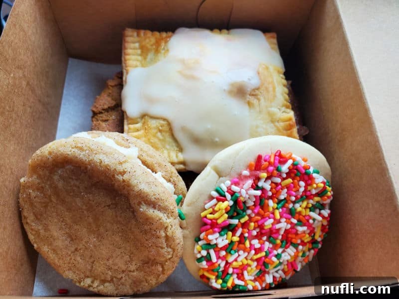 Spokane's Top Bakeries: Your Sweetest Guide 4 cookies and poptarts in a bakery box