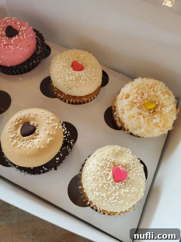 Spokane's Sweetest Spots A Bakery Guide 10 cupcakes in a cardboard bakery box
