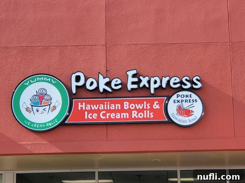 Poke express Hawaiian bowls & ice cream rolls sign on a red building