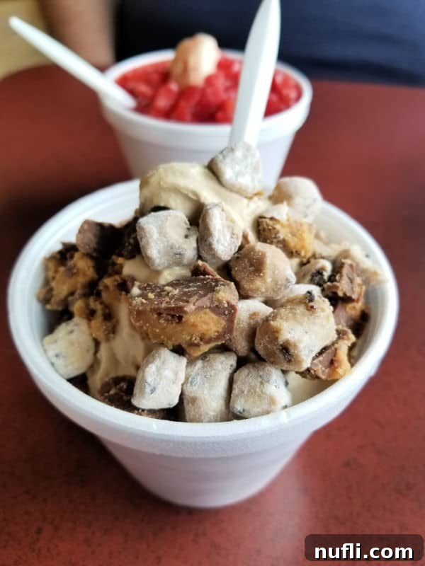cookie dough on top of frozen yogurt in a cup