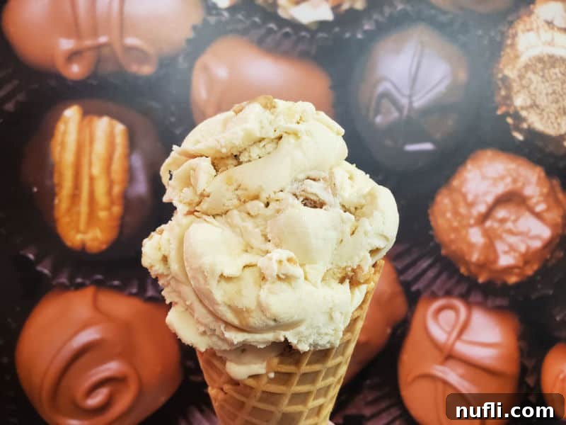 ice cream cone in front of a poster of chocolates