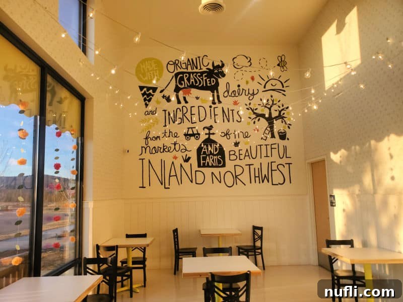 mural with organic grass fed dairy ingredients above tables and chairs