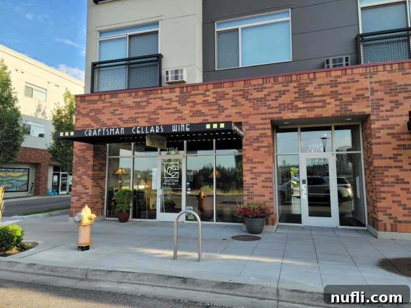 Craftsman Cellars Wine over the entrance to a wine bar in a brick lower building 