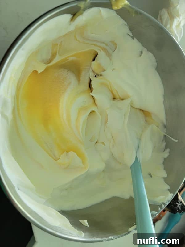 Thickening pudding mixture after refrigeration, ready for the next step.