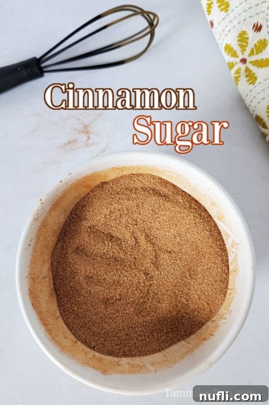 Cinnamon Sugar text over a bowl filled with cinnamon sugar