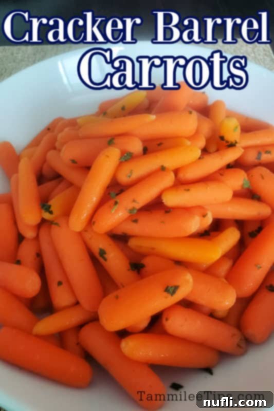 Cracker Barrel Copycat Carrots 2 Cracker Barrel Carrots in a white bowl on a brown placemat
