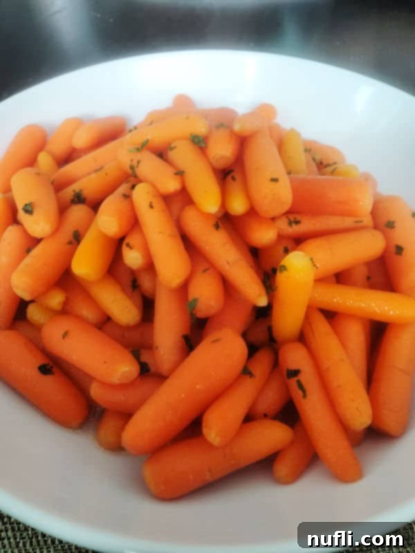 Cracker Barrel Copycat Carrots 6 Cracker Barrel Carrots in a white bowl on a dark table