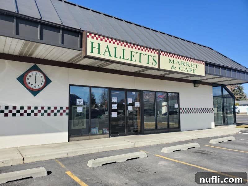 Halletts Market & Cafe sign over the entrance door to the candy shop