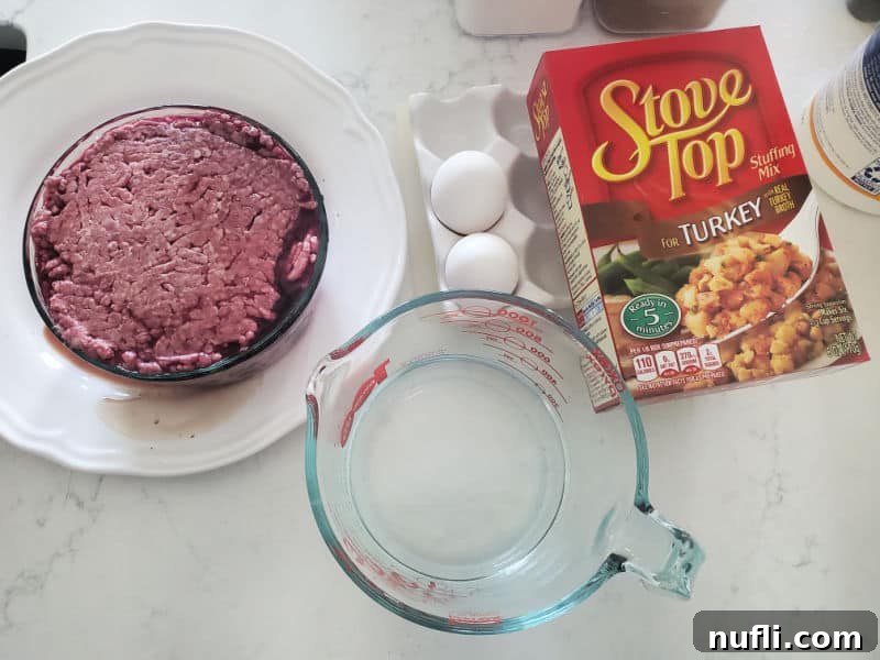 ground beef, eggs, water in a measuring glass, and stove top stuffing. 