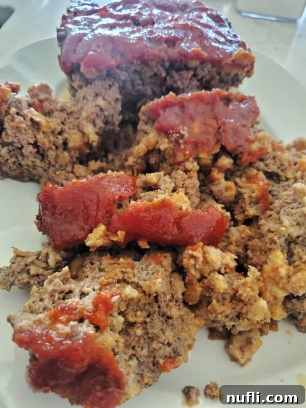 Pieces of Stove Top Meatloaf on a white plate