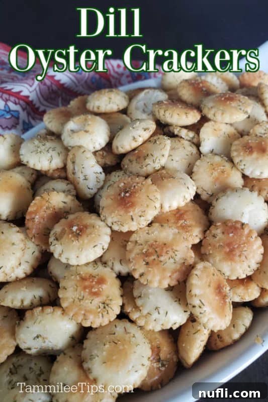 Freshly baked Dill Oyster Crackers displayed in a white bowl, ready to be enjoyed as a snack or topping.