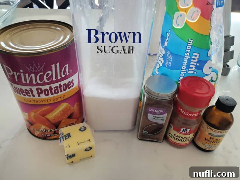 canned sweet potatoes, sugar, butter, mini marshmallows, nutmeg, cinnamon, and vanilla on a white counter