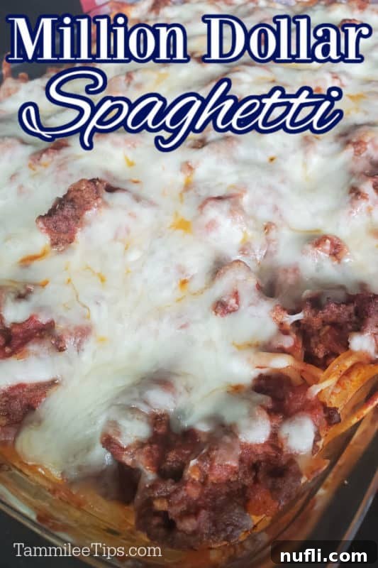 Million dollar spaghetti over a casserole dish with cheese and ground beef spaghetti casserole