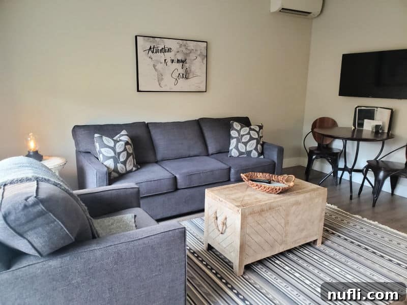 Hotel Roslyn living room with map, couches, and table and chairs