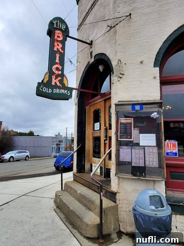 The Brick Cold Drinks sign and entrance to this Roslyn Restaurant