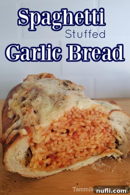 Ultimate Spaghetti Stuffed Garlic Bread 2 Spaghetti Stuffed Garlic Bread over a loaf of bread stuffed with spaghetti topped with melted cheese
