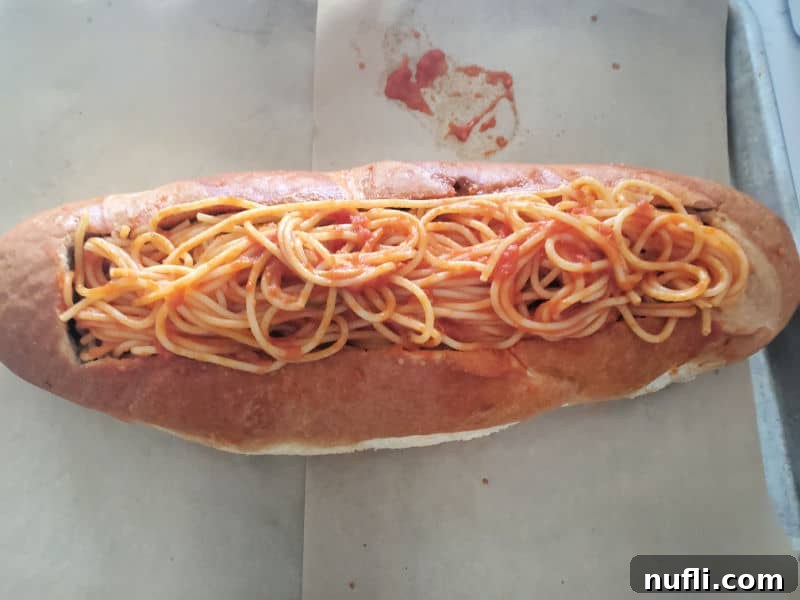 Ultimate Spaghetti Stuffed Garlic Bread 4 spaghetti in a loaf of bread
