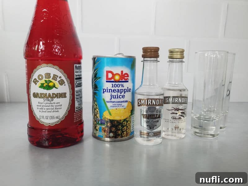 roses grenadine, pineapple juice, smirnoff vanilla vodka next to to empty shot glasses