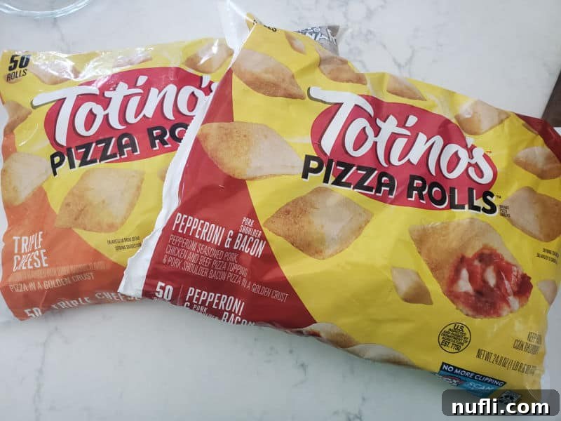 Two bags of Totino's pizza rolls on a clean white counter, ready for air frying.
