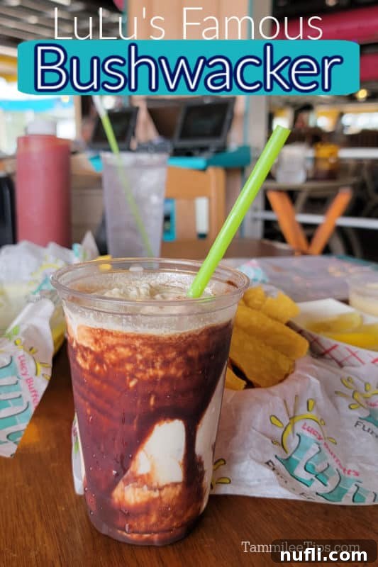LuLu's Famous Bushwacker text over a plastic cup with chocolate Bushwacker and a green straw