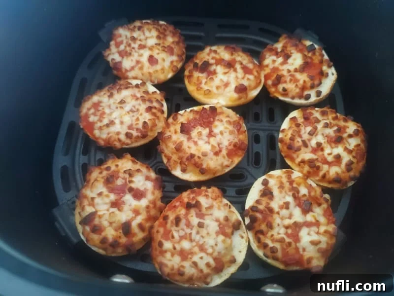 Pizza bagel bites in the air fryer basket