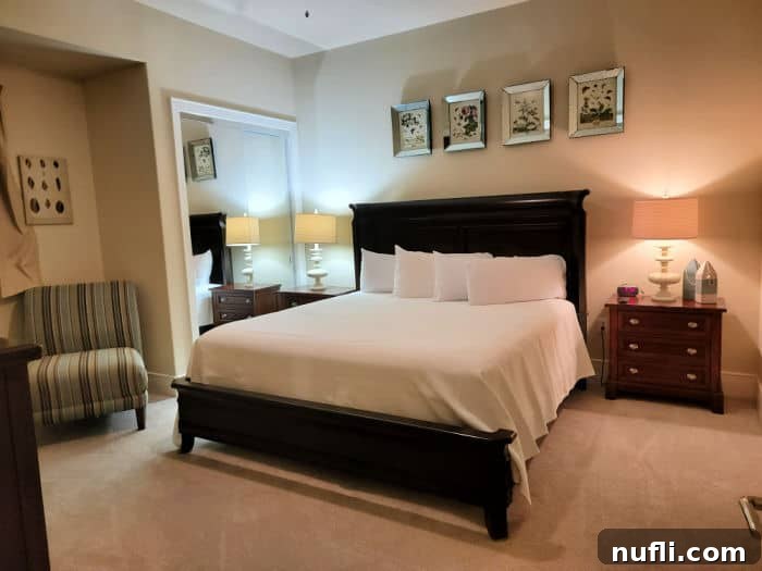 Turquoise Place: Orange Beach Alabama's Luxury Gulf Resort 12 Large bed with a chair near it and night stand