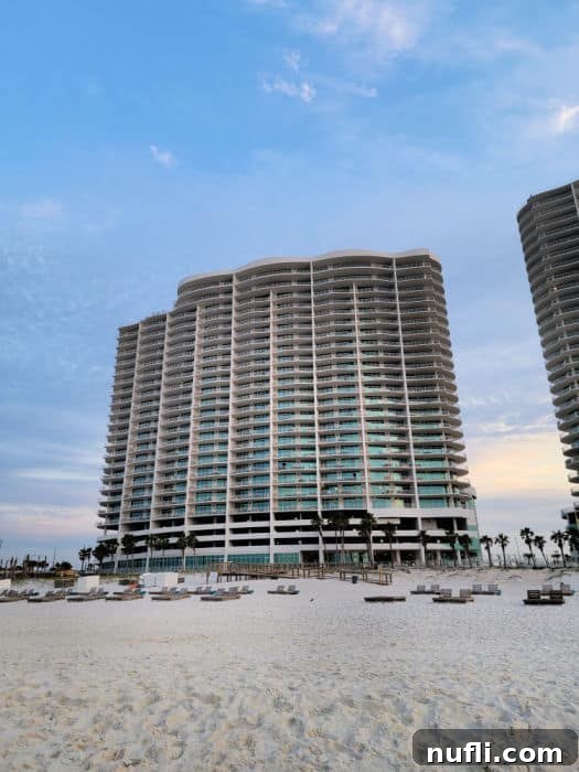 Turquoise Place: Orange Beach Alabama's Luxury Gulf Resort 15 Turquoise Place condo complex from the sand with beach chairs in front of it